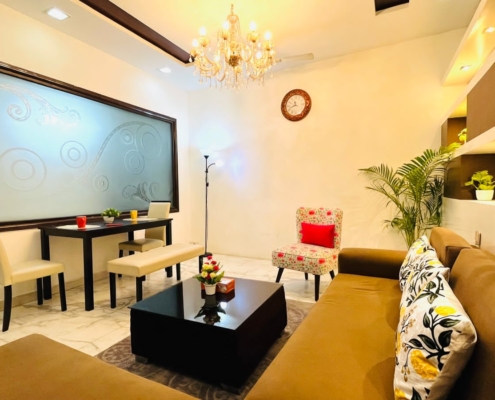 Serviced Apartments in Delhi with furnished living area.